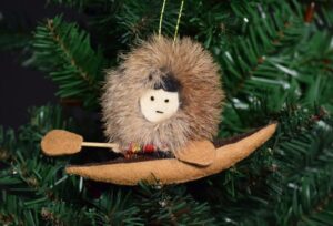 Eskimo in Canoe Ornament